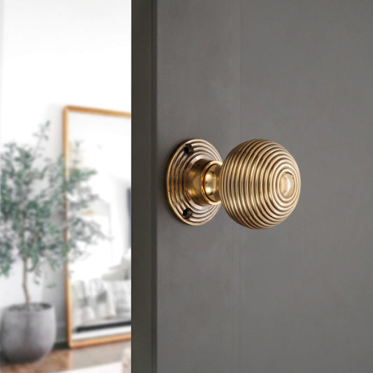 Hollow Beehive 50mm Rim/Mortice Door Knob Aged Brass