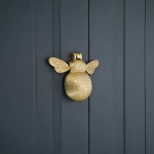 Heurtoir de porte Bumble Bee en laiton poli