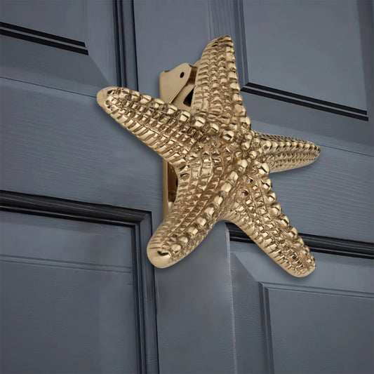 Heurtoir de porte étoile de mer en laiton poli