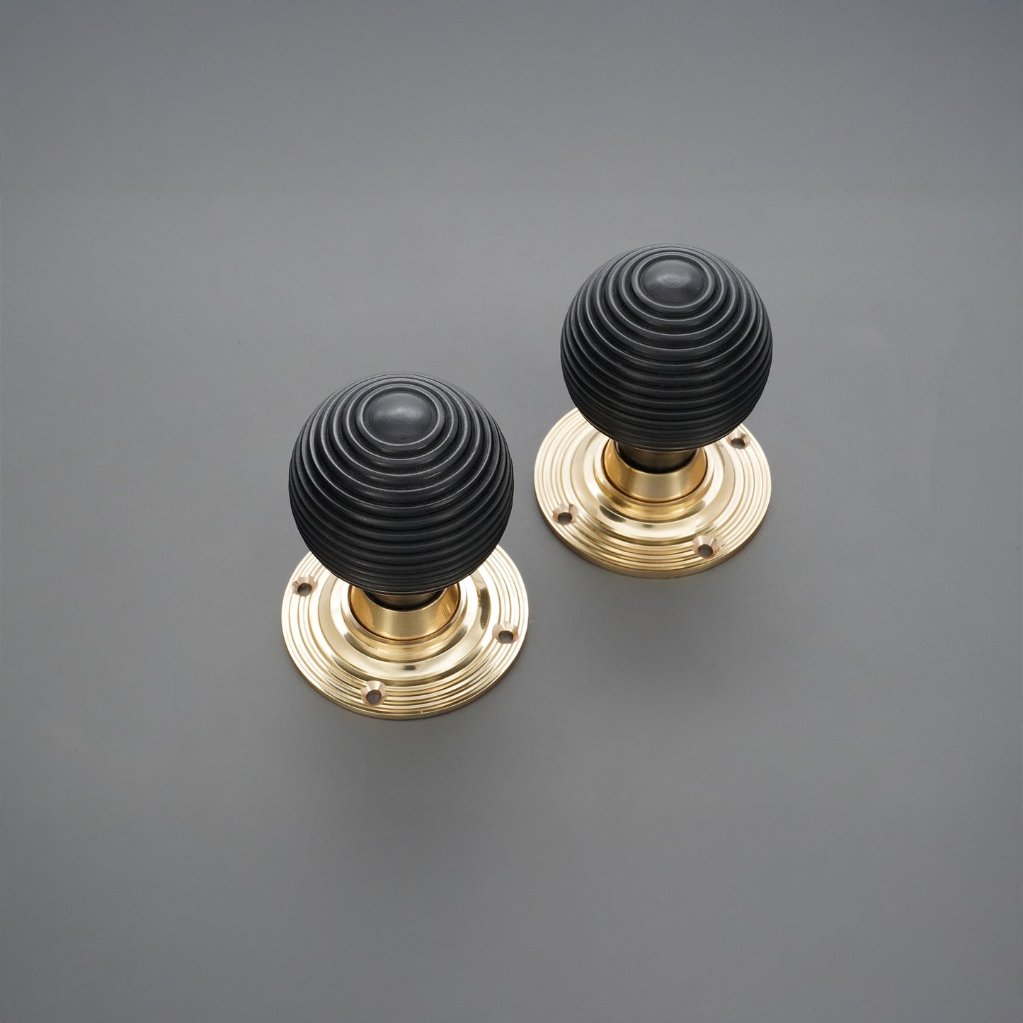 Ebony Wood Beehive Rim/Mortice Door Knob Polished Brass