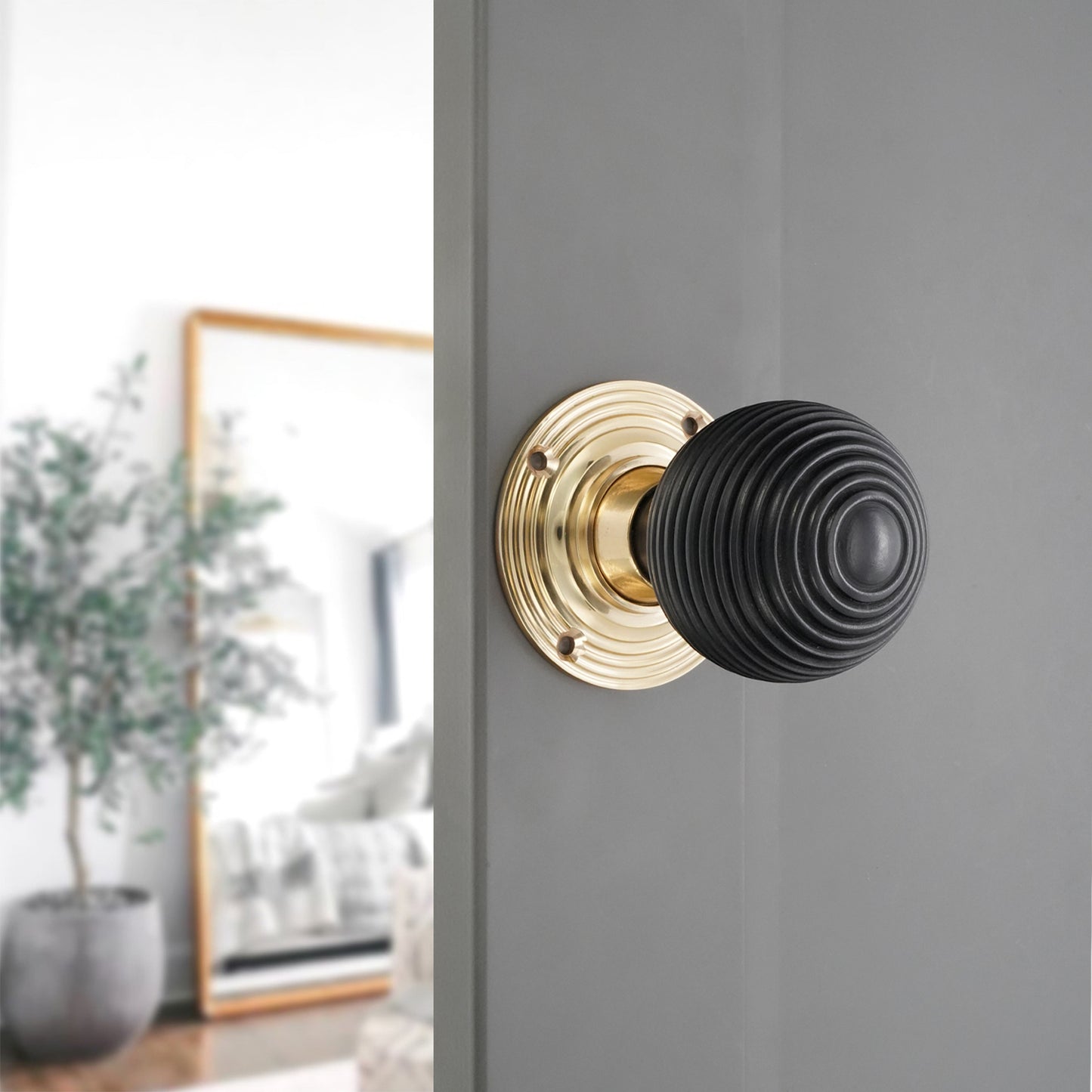 Ebony Wood Beehive Rim/Mortice Door Knob Polished Brass