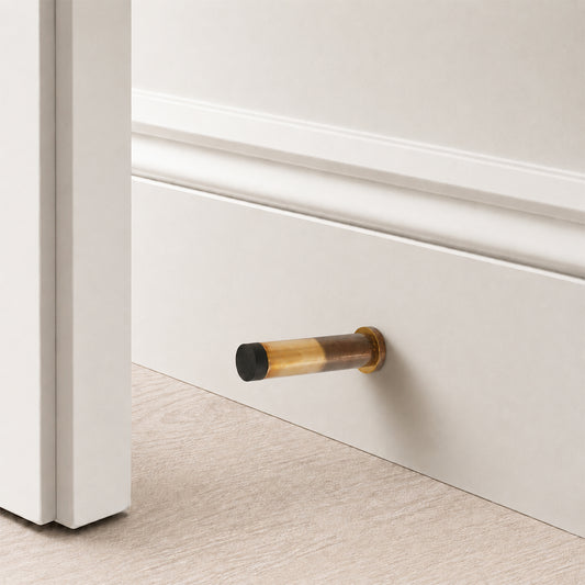 Opal Knurlmond Door Stop Aged Brass