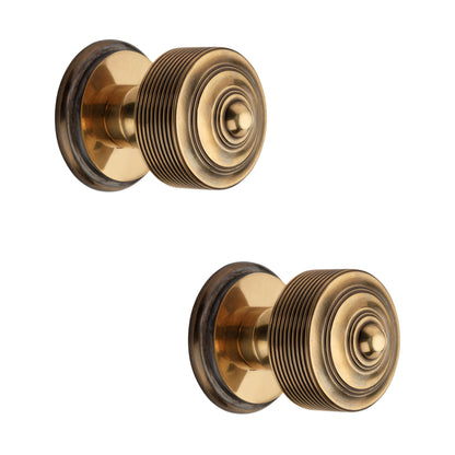 Carter Rim Door Knob Aged Brass Home Decor