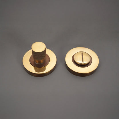 Bijou Knurlmond à bouton tournant et déverrouillage en laiton vieilli