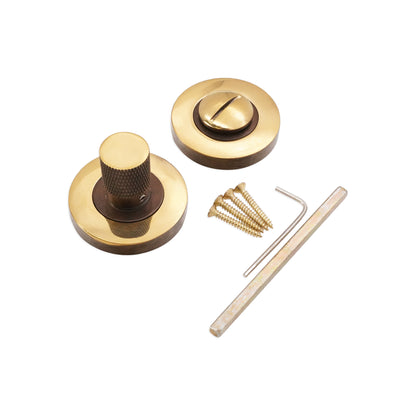 Bijou Knurlmond à bouton tournant et déverrouillage en laiton vieilli