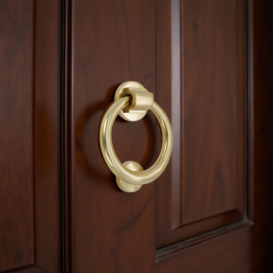 Heurtoir de porte à anneau 110 mm en laiton poli