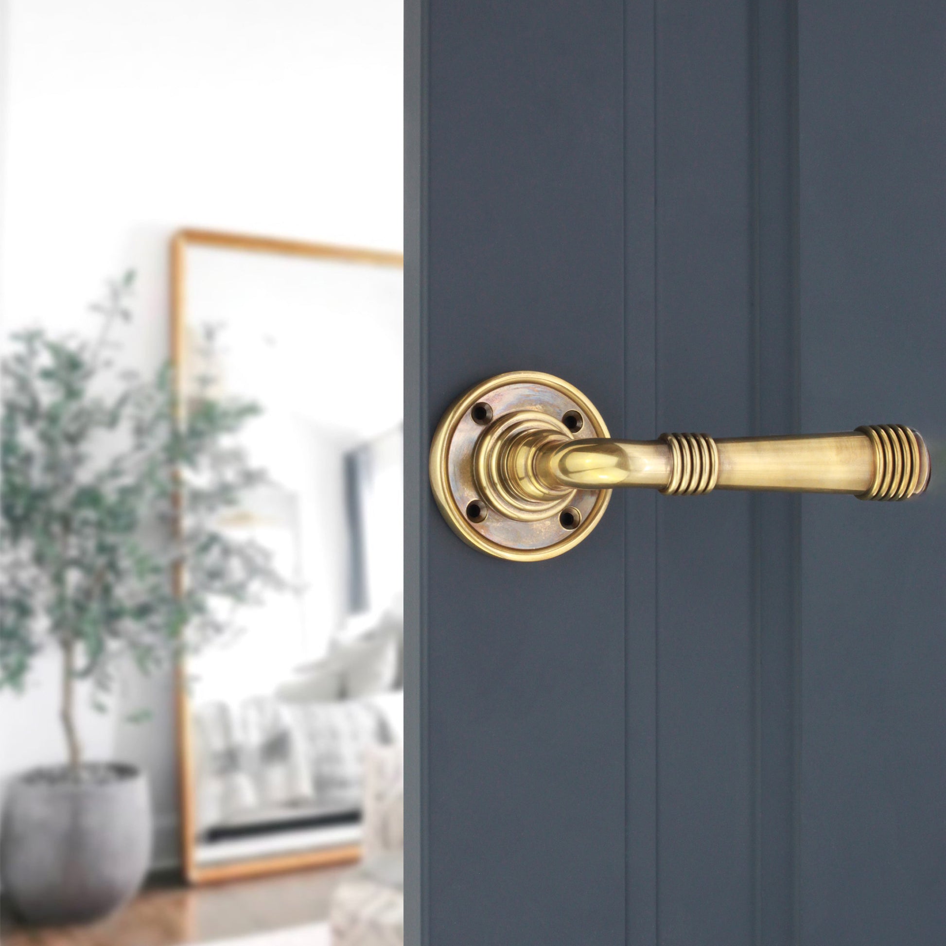 Aged Brass Beehive Lever on Rose Home Decor